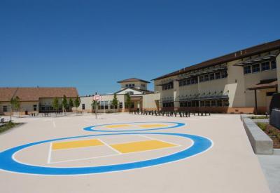 Martin Luther King, Jr. Elementary School in Richmond, CA, which adopted cool pavement coatings to qualify as a high performance school (Architect: Quattrocchi Kwok, landscape architect: Vallier Design Associates)