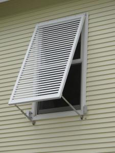 Preventing solar heat gain through windows is most effective if the shading is on the outside, such as with this louvered window shade in Florida. Photo source: Alex Wilson, Resilient Design Institute